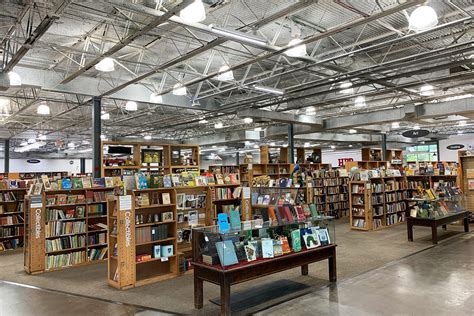 what time does half price books open? And how do bookstores like Half Price Books balance their financial goals with the need to provide quality customer service?